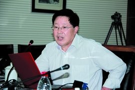 吴成国 